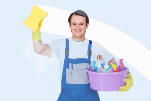 Professional carpet cleaners working carefully in a Slade Green home